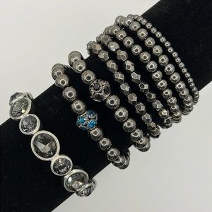 Lot of eight Paparazzi stretch bracelets.